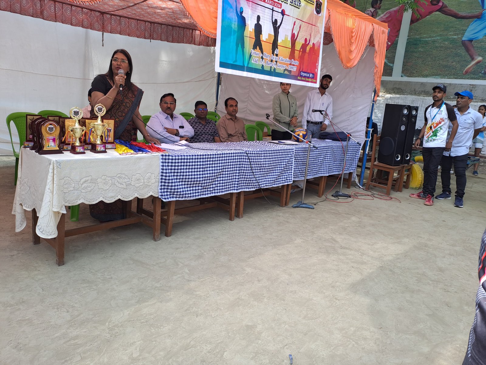 Students receiving awards on stage